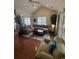 Spacious living room with comfortable seating and plenty of natural light at 448 Mahogany Dr. # 201, Murrells Inlet, SC 29576