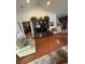 Cozy living room featuring a large entertainment center and open access to the kitchen at 448 Mahogany Dr. # 201, Murrells Inlet, SC 29576