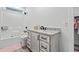 Full bathroom featuring a shower-tub, a decorative vanity, and lots of storage at 4486 Bethel Rd., Aynor, SC 29511