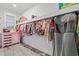 Charming closet with a pink cabinet, shelving, and hanging space for clothes at 4486 Bethel Rd., Aynor, SC 29511