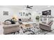 Inviting living room with neutral tones, stylish furnishings, and ample natural light at 4486 Bethel Rd., Aynor, SC 29511