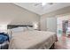 Serene main bedroom featuring a comfortable king-sized bed, neutral walls, and an open closet space at 4486 Bethel Rd., Aynor, SC 29511