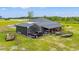 The property features covered parking and workshop, offering ample space for vehicles and projects at 4486 Bethel Rd., Aynor, SC 29511