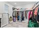A well-organized walk-in closet with shelving, racks, and organized storage solutions at 4486 Bethel Rd., Aynor, SC 29511
