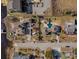 Expansive aerial view of unique home with lush yard, circular driveway, and picturesque neighborhood at 4552 River Rd., Little River, SC 29566