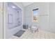 A charming bathroom featuring a light purple bathtub and tile flooring at 4552 River Rd., Little River, SC 29566