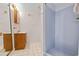 Cozy bathroom featuring a vanity and walk-in shower at 4552 River Rd., Little River, SC 29566