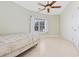 Simple bedroom with a window, fan and bed frame at 4552 River Rd., Little River, SC 29566