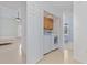 Convenient laundry area adjacent to bedroom and bathroom at 4552 River Rd., Little River, SC 29566