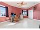 Well-lit office space with a cozy desk area and natural light from two windows at 4552 River Rd., Little River, SC 29566