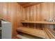 Classic wooden sauna featuring wooden benches and backrests at 4552 River Rd., Little River, SC 29566