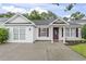 Charming single-story home with white siding, a well-manicured lawn, and a welcoming front entrance at 462 Wallingford Circle, Myrtle Beach, SC 29588