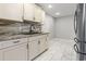 Bright kitchen featuring stainless steel appliances, ample counter space, and an open layout at 462 Wallingford Circle, Myrtle Beach, SC 29588