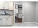 Well-lit kitchen showcasing sleek granite countertops and stylish white cabinets at 462 Wallingford Circle, Myrtle Beach, SC 29588