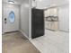 Bright kitchen with marble tile floors and white cabinets, providing a clean and modern look at 462 Wallingford Circle, Myrtle Beach, SC 29588