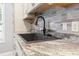 Close-up of a kitchen sink with stylish faucet and countertop at 462 Wallingford Circle, Myrtle Beach, SC 29588