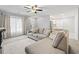 Spacious living room featuring a sectional sofa, natural light, and access to other rooms at 462 Wallingford Circle, Myrtle Beach, SC 29588