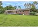 Well-maintained backyard with a large deck and plenty of green space at 475 Willard Rd., Conway, SC 29526
