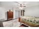 Cozy bedroom features a ceiling fan, hardwood floors, and ample closet space at 475 Willard Rd., Conway, SC 29526