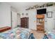 Inviting bedroom with twin beds, built-in shelving, and a closet for storage at 475 Willard Rd., Conway, SC 29526
