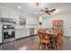 Well-lit kitchen featuring ample counter space, stainless steel appliances, and a cozy dining area at 475 Willard Rd., Conway, SC 29526