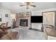 Inviting living room with a brick fireplace, wood accents, and an open layout, ideal for gatherings at 475 Willard Rd., Conway, SC 29526