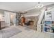 Cozy living room area with a brick fireplace and tile flooring at 475 Willard Rd., Conway, SC 29526