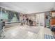 Large room with natural light, tile flooring, and ample storage space at 475 Willard Rd., Conway, SC 29526