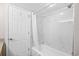 Bathroom view showing the tub, shower, toilet and partial view of the vanity and lighting at 4800 S Ocean Blvd. # 514, North Myrtle Beach, SC 29582