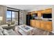 Bright and airy living room connecting to the kitchenette and balcony with beach views at 4800 S Ocean Blvd. # 514, North Myrtle Beach, SC 29582