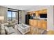 Inviting living room area with a kitchenette and balcony overlooking the beach at 4800 S Ocean Blvd. # 514, North Myrtle Beach, SC 29582