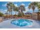 Inviting outdoor pool surrounded by lush palm trees and well-maintained landscaping at 4800 S Ocean Blvd. # 514, North Myrtle Beach, SC 29582