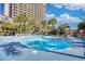 Large, inviting outdoor pool with plenty of lounge chairs for relaxing by the water at 4800 S Ocean Blvd. # 514, North Myrtle Beach, SC 29582