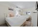 Bright bedroom with two beds, shuttered windows, wood-look flooring, and neutral decor at 4800 S Ocean Blvd. # 920, North Myrtle Beach, SC 29582