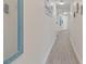 Hallway featuring beach themed decoration and gray wood-look tile at 4800 S Ocean Blvd. # 920, North Myrtle Beach, SC 29582