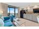 Cozy living area with a modern kitchen including a balcony and ocean views at 4800 S Ocean Blvd. # 920, North Myrtle Beach, SC 29582