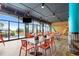 Modern restaurant with large windows, comfortable seating, and views of the resort pool at 4800 S Ocean Blvd. # 920, North Myrtle Beach, SC 29582