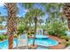Lush resort water feature with tropical trees, a bridge, and relaxing fountains at 4800 S Ocean Blvd. # 920, North Myrtle Beach, SC 29582