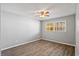 Bedroom space is filled with natural light that comes through a large window and laminate floors at 482 Greenview Dr. # 5B, Johnsonville, SC 29555