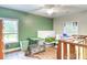 Bedroom with a green accent wall, ceiling fan, and closet at 4867 Wolf Trail, Conway, SC 29527