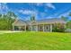 Charming single-story home with a large front yard, covered parking, and a welcoming front porch at 4867 Wolf Trail, Conway, SC 29527