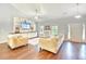 Comfortable living room featuring stylish furniture, hardwood floors, and a bright and airy atmosphere at 4867 Wolf Trail, Conway, SC 29527