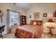 Inviting bedroom with a comfortable bed, accent pillows, and ample natural light at 4894 Luster Leaf Circle # 403, Myrtle Beach, SC 29577