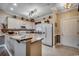 Well-lit kitchen with stainless steel appliances, granite countertops, and ample cabinet space at 4894 Luster Leaf Circle # 403, Myrtle Beach, SC 29577