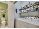 Practical laundry room with appliances, shelving and adjacent to the bathroom at 4894 Luster Leaf Circle # 403, Myrtle Beach, SC 29577