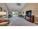 Comfortable living room with a plush sofa, fireplace, and sliding glass doors leading to a balcony at 4894 Luster Leaf Circle # 403, Myrtle Beach, SC 29577