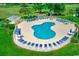 Outdoor pool features numerous lounge chairs for community residents at 4894 Luster Leaf Circle # 403, Myrtle Beach, SC 29577