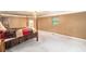 Bedroom with a four-poster bed and an ensuite bathroom, bathed in natural light at 4920 Meadow St., Loris, SC 29569