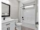 Clean, well-lit bathroom features a modern vanity, toilet, and walk-in shower at 558 Oxbow Dr., Myrtle Beach, SC 29579