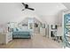 Comfortable bedroom with white furniture, an expansive window view, and a dedicated work space at 558 Oxbow Dr., Myrtle Beach, SC 29579